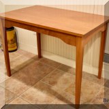 F51. Cherry table. 28”h x 38”w x 24”d 